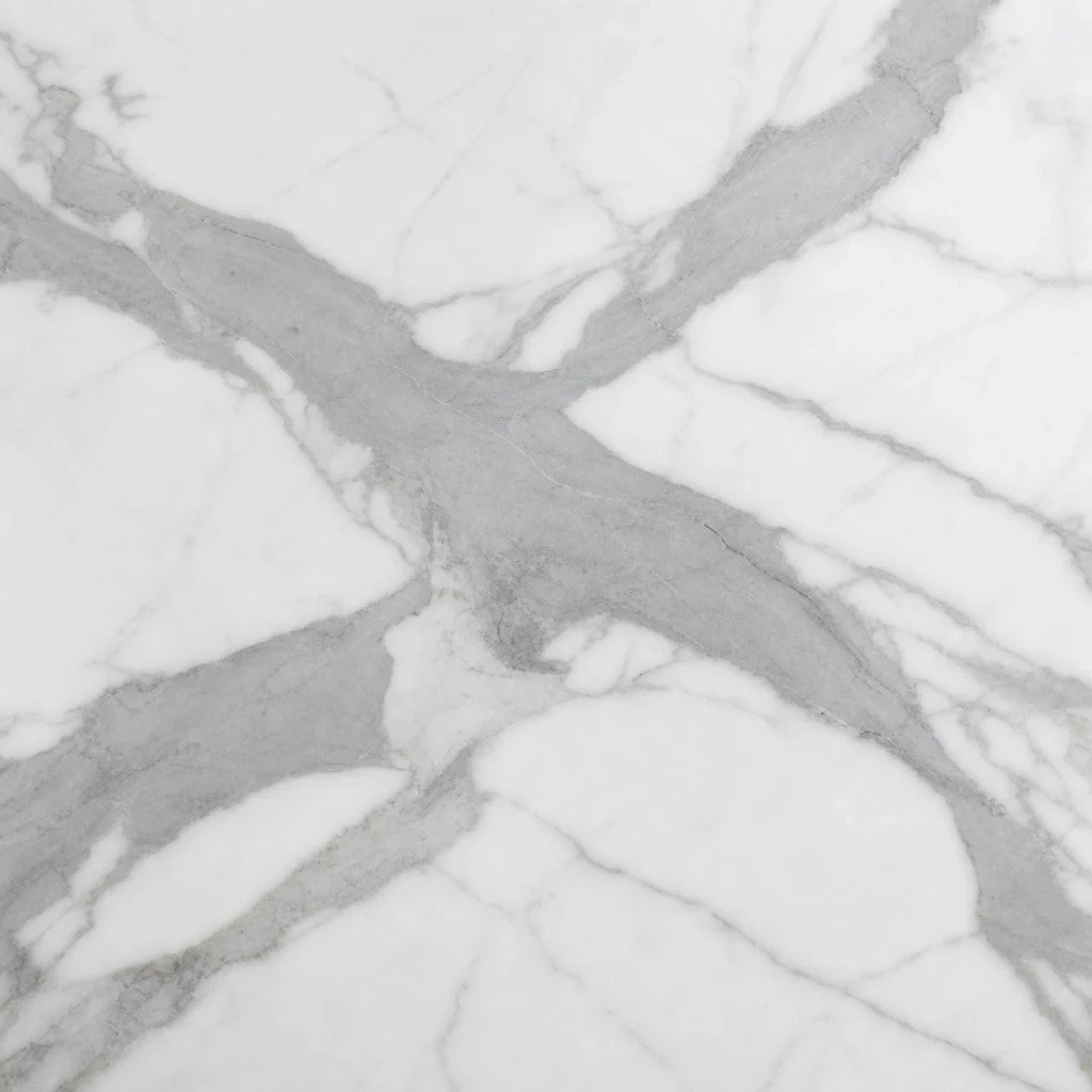 Statuario marble with gray veining on a white surface