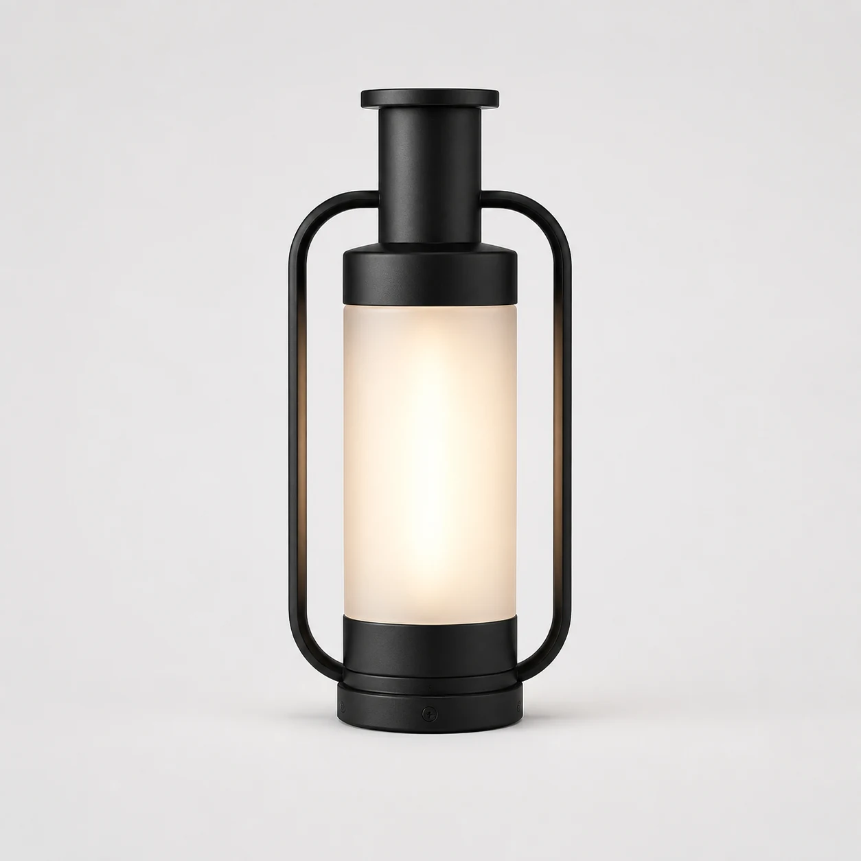 Black portable outdoor lantern with warm diffused light